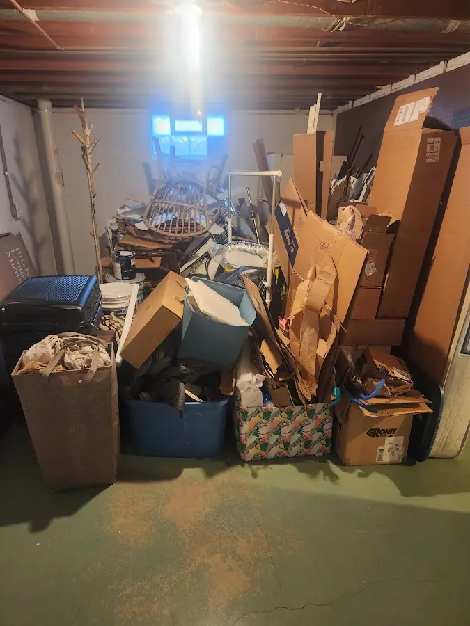 Roll-off dumpster container at job site for Concrete Dumpster Rental in Asbury